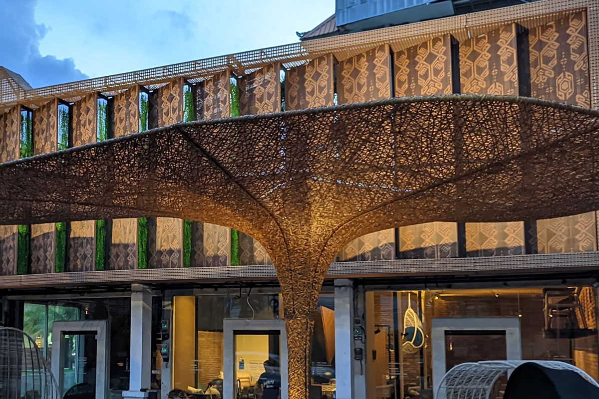 Facade with Fire Retardant Wicker facade panel with fire-retardant synthetic rattan for facade exterior decoration